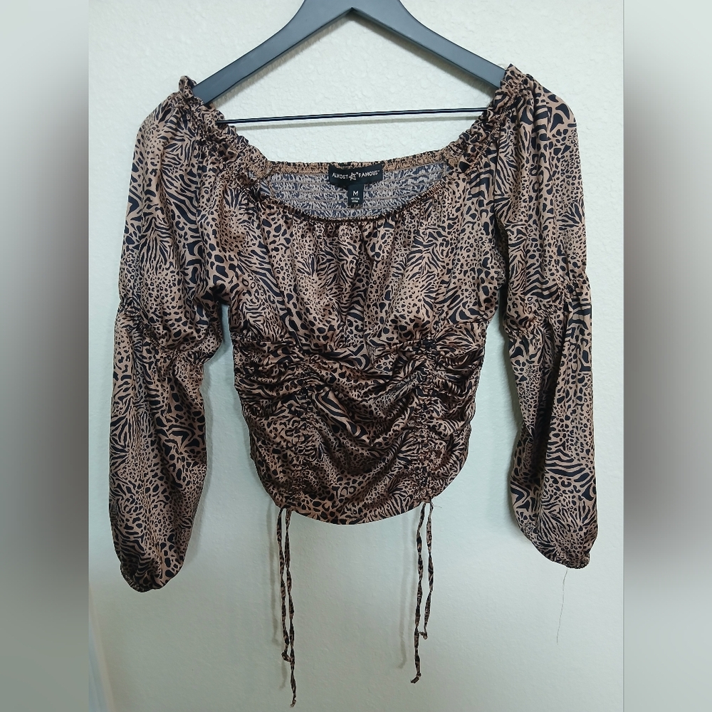 ALMOST FAMOUS Animal print Blouse •Size M